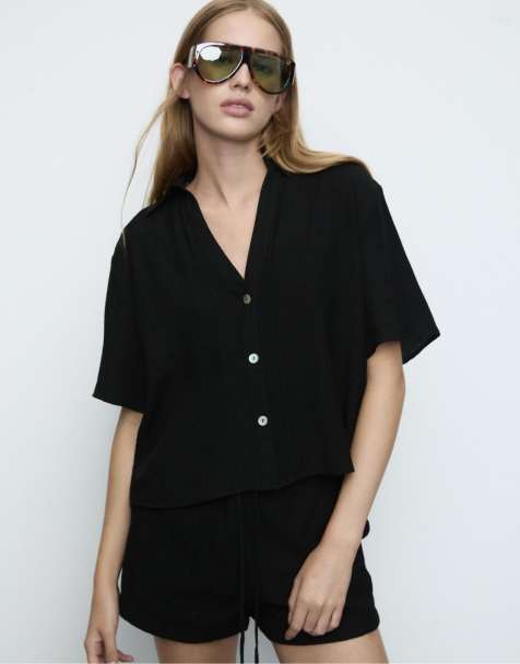 Stradivarius Button-up flowing shirt in black - view 1