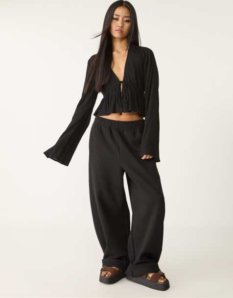 Stradivarius - Camicia nera con volant e laccetti - view 1