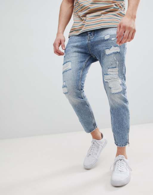 Stradivarius carrot fit jeans with zips and abrasion in light blue