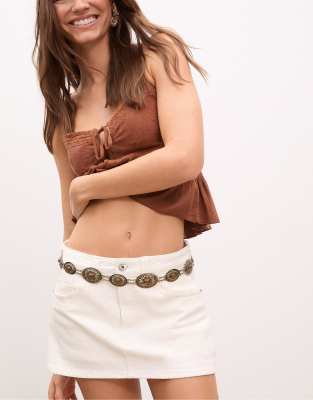 Ceinture en mtal avec dtails contrastants - Dor - Stradivarius - Modalova