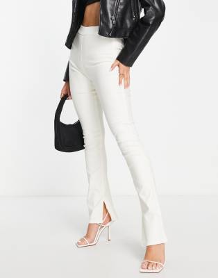 Stradivarius coated flare jean with split hem detail in ecru-White