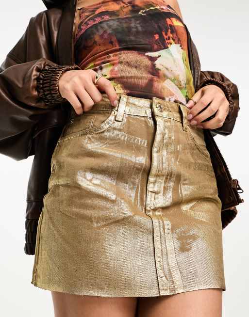 Stradivarius coated mini skirt in gold ASOS