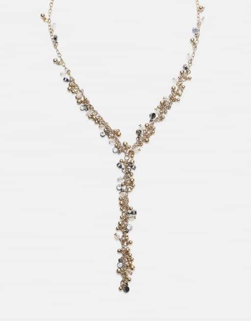 Stradivarius collana lariat lunga con perline color oro, 1 di 4