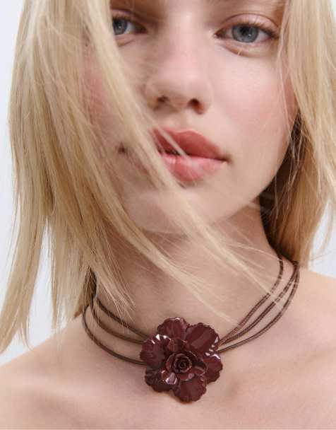 Stradivarius Cord necklace with metal flower in brown - view 1