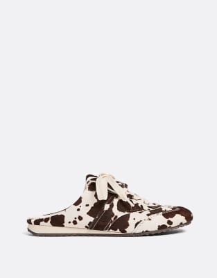  Cow print mule trainers coloured