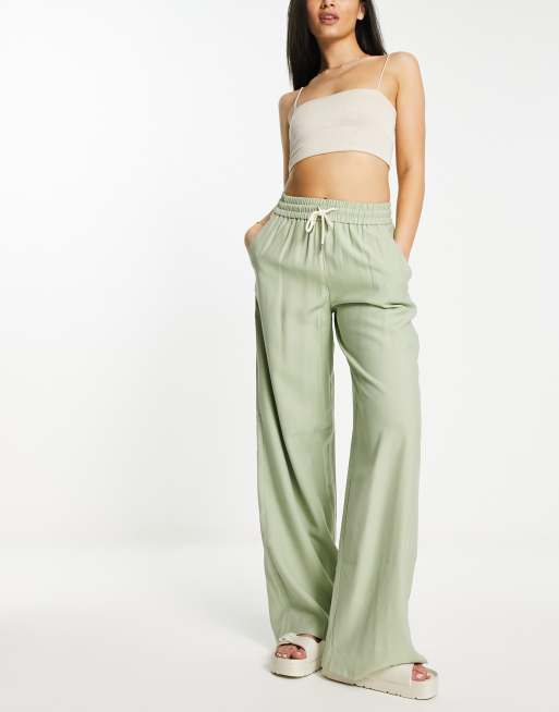 Stradivarius crinkle pull on wide leg pants in khaki | ASOS