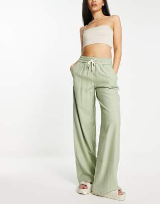 Stradivarius crinkle pull on wide leg trouser in khaki | ASOS