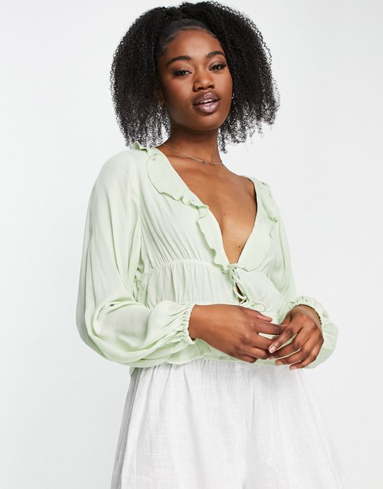 https://images.asos-media.com/products/stradivarius-crinkle-ruffle-blouse-in-sage/202534974-1-sagegreen?$n_550w$&wid=550&fit=constrain