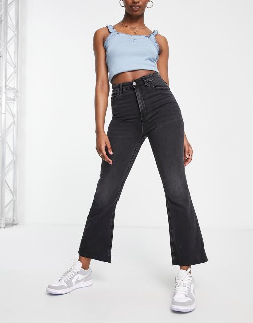 Stradivarius Petite crop flare jeans in black