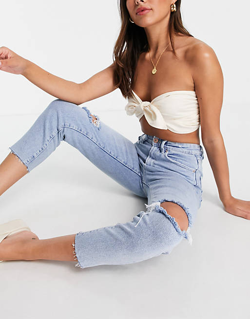 Stradivarius cropped cotton slim mom jeans with stretch and rip in light  blue - MBLUE | ASOS