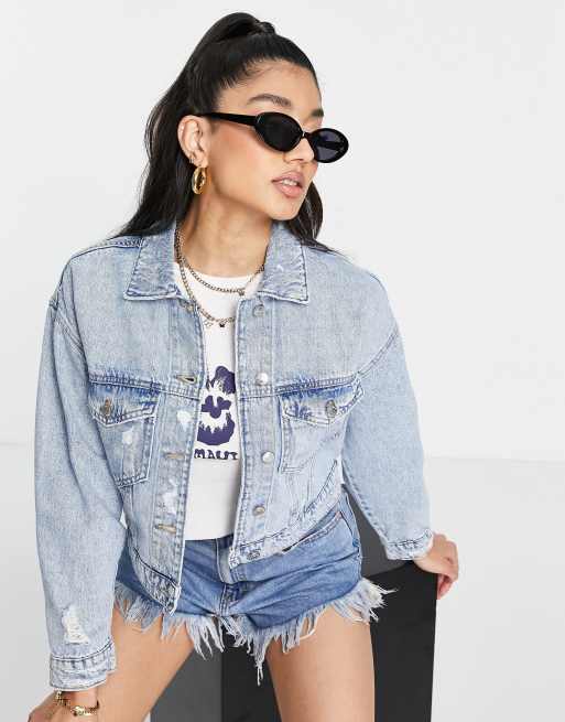 Stradivarius cropped denim jacket with rips in medium blue ASOS