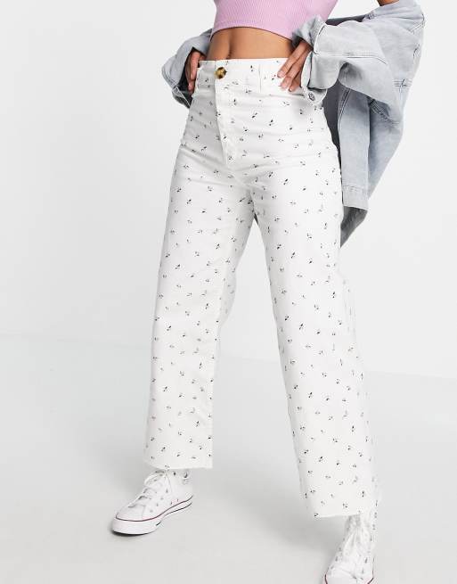 Stradivarius - Cropped jeans met wijde pijpen en bloemenprint in wit