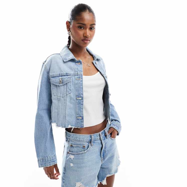 Stradivarius cropped raw hem denim jacket in washed blue | ASOS