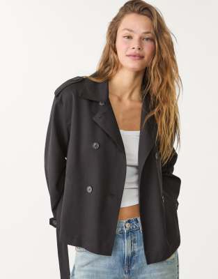 Stradivarius cropped trench coat with belt in black | ASOS