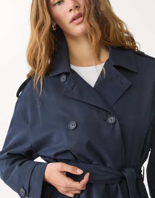 Stradivarius cropped trench coat with belt in navy blue | ASOS
