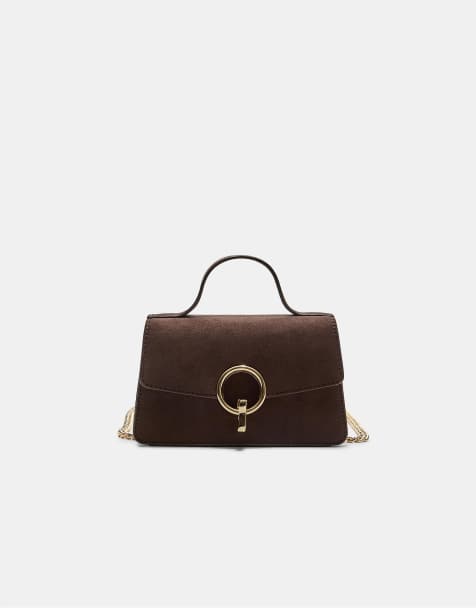 Stradivarius Crossbody bag with a round clasp in brown - view 1