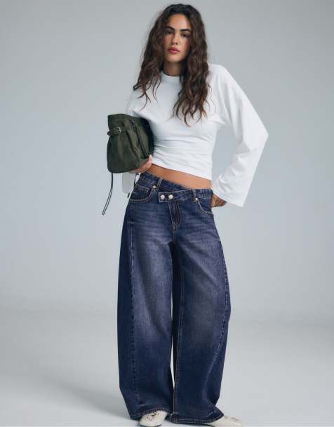Stradivarius Crossover waist baggy jeans in medium denim wash - view 1