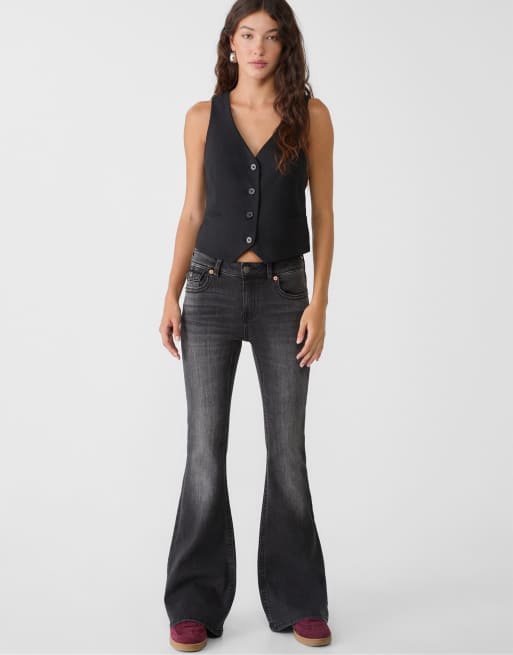 Stradivarius – D04 – Bleksvarta, utsvängda jeans med låg midja