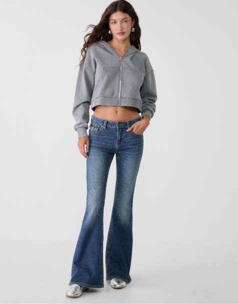 Stradivarius – D04 – Mellanblå, tvättade jeans med låg midja och utsvängd design - view 1
