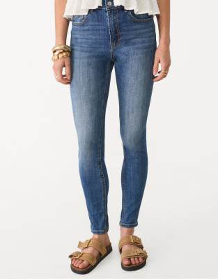 D07 - Jean skinny à taille standard - Bleu délavé 36