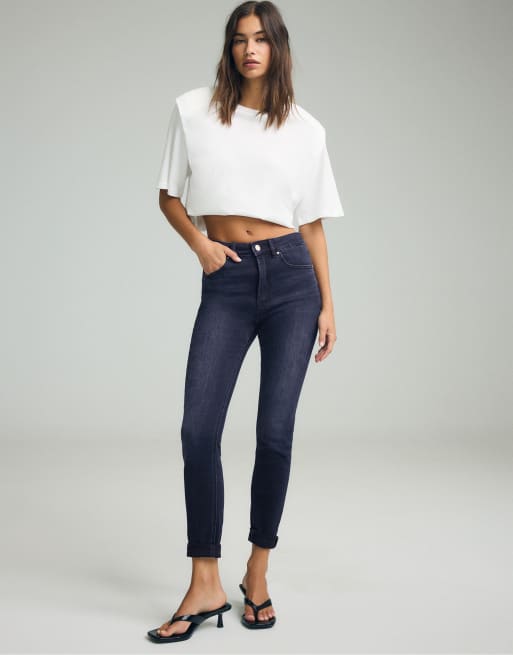 Stradivarius D07 regular waist skinny jeans in middenblauwe denimwassing, 5 van 7