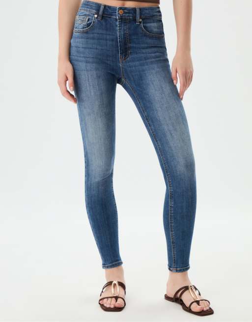 Stradivarius D07 regular waist skinny jeans in washed blue denim