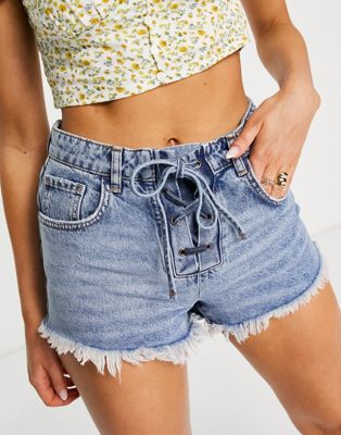 Stradivarius denim hotpant with lace up waist in deep blue wash