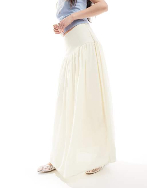Stradivarius drop waist midi skirt in yellow