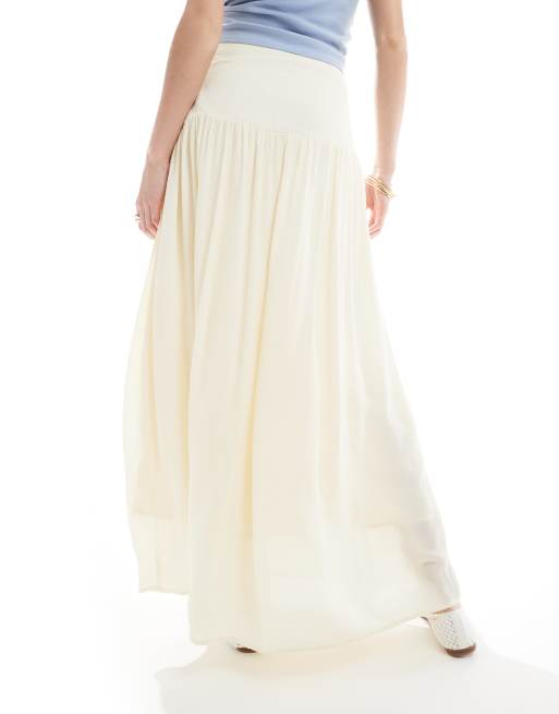 Stradivarius drop waist midi skirt in yellow