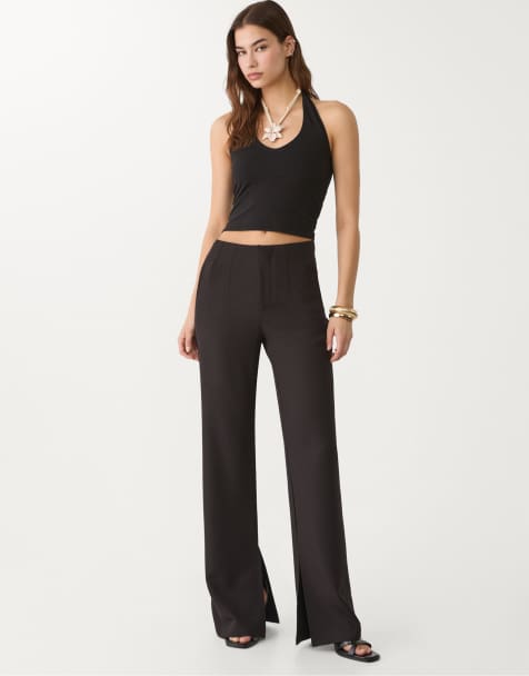 Stradivarius - Elegante broek met uitlopende pijpen en split in zwart - view 1
