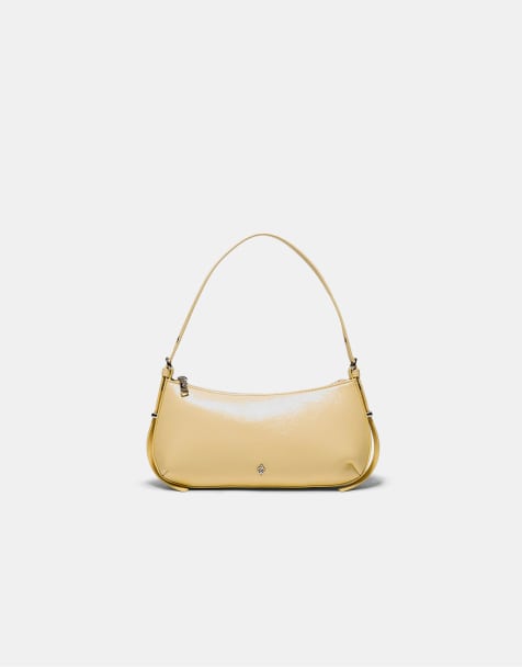 Stradivarius Elongated eyelet shoulder bag in pastel yellow - view 1