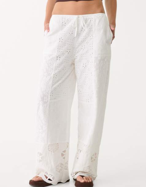 Stradivarius embroidered patchwork trousers in white 