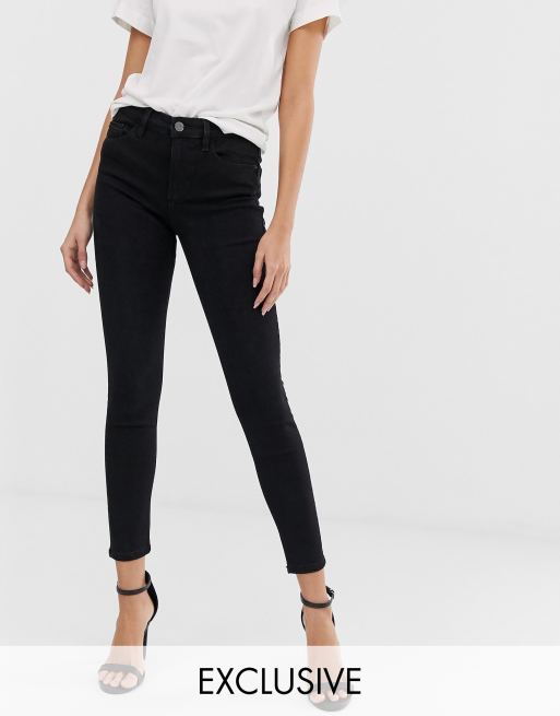 Stradivarius – Eng geschnittene Jeans in Schwarz mit niedrigem Bund