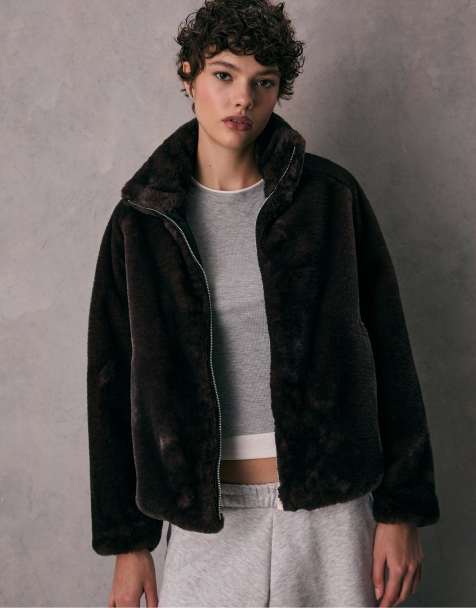 Stradivarius Faux fur jacket with high neck in black - view 1