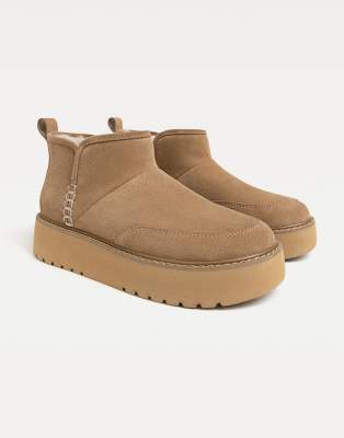  faux fur leather ankle boots in beige
