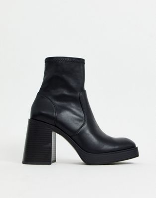 Stradivarius faux leather chunky pull on boot in black | ASOS