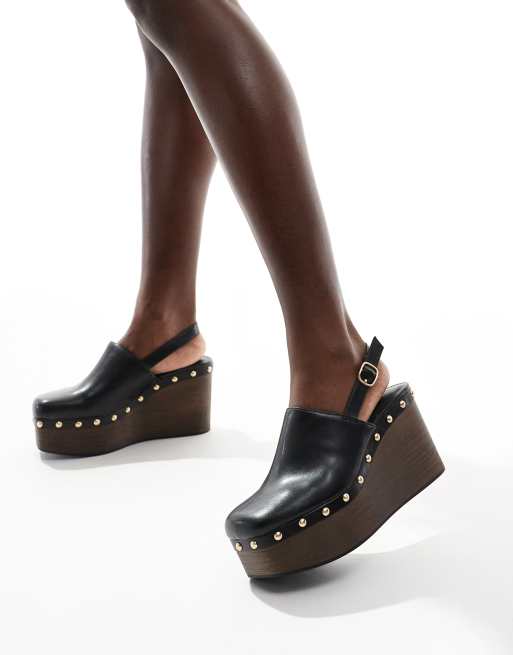 Stradivarius faux leather wedges with studs in black