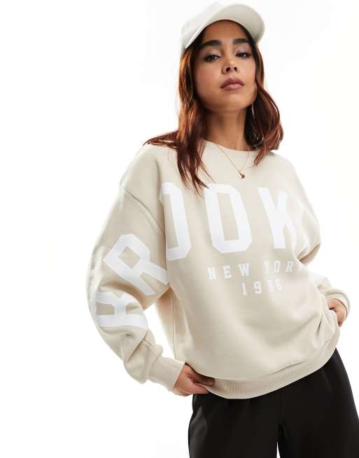 Stradivarius - Felpa oversize color avena con grafica 