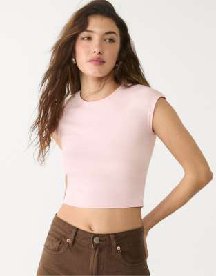 Stradivarius - Figurbetontes Basic-T-Shirt in Pastellrosa mit kurzem Schnitt