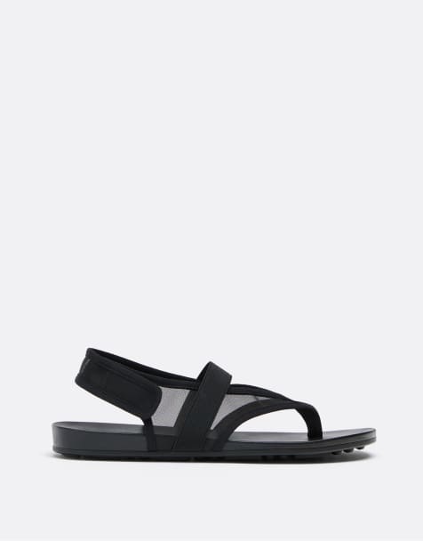 Stradivarius – Flache Zehenstegsandalen mit Netzstoff in Schwarz - view 1