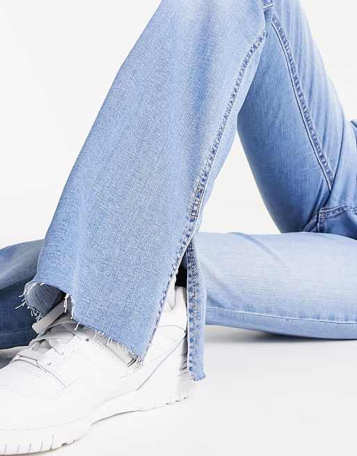 Stradivarius flare jean with side slit in light blue