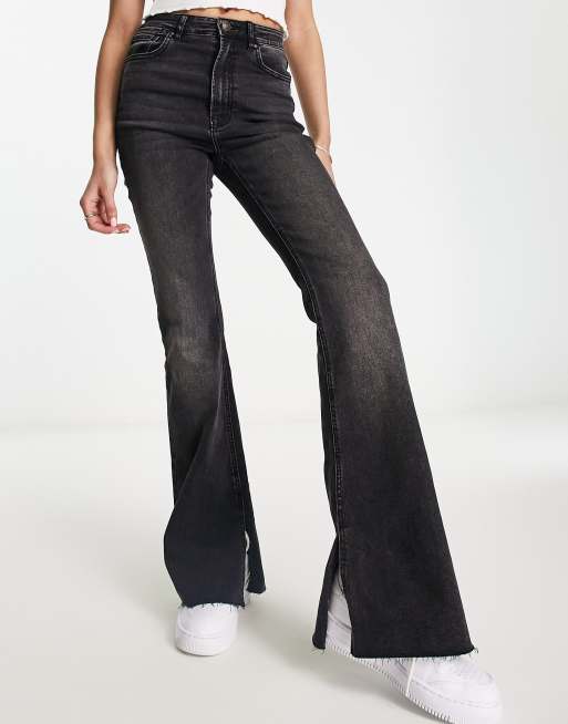 Stradivarius flare jeans with side split in black