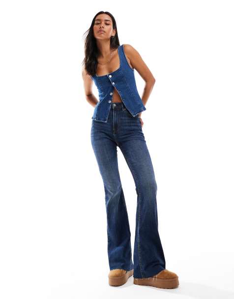 Stradivarius flared jeans with slit in overdyed blue