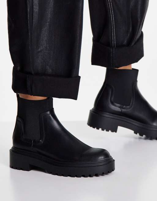 Black chelsea shop boots rubber sole