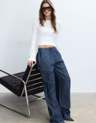 Fließende Jeans in blauer Rinse-Waschung mit Kordelzug Blau XS