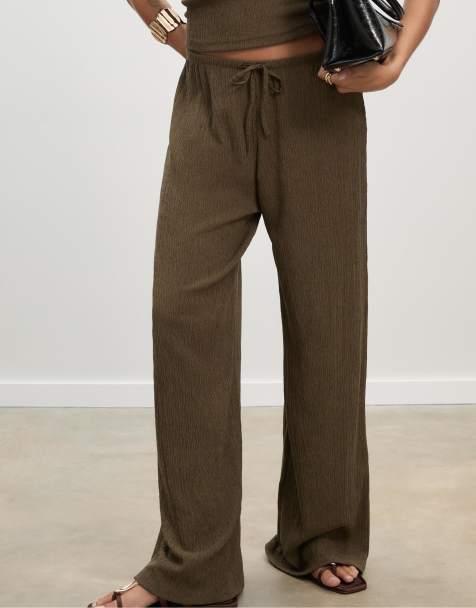 Stradivarius Flowing creased-effect trousers in khaki - view 1