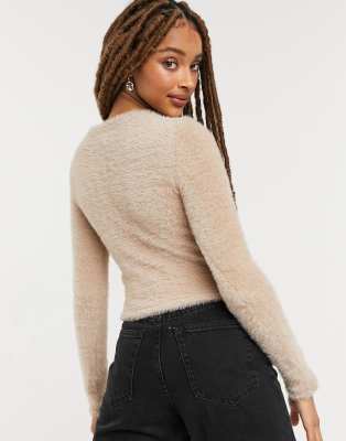 beige fluffy jumper