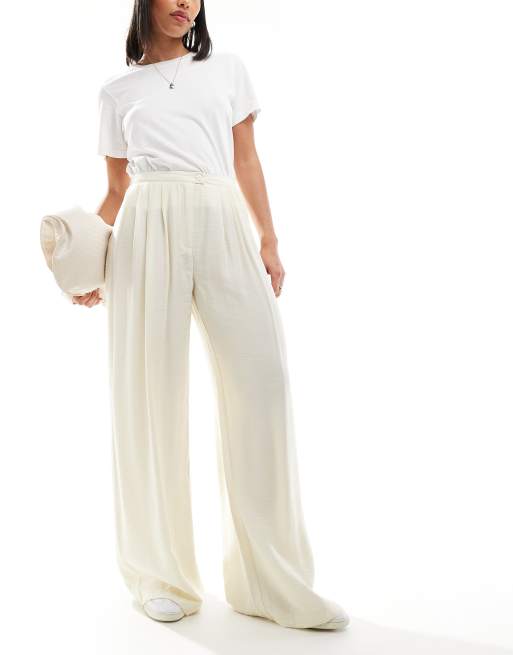 Stradivarius fluid pleat front pants in buttermilk | ASOS