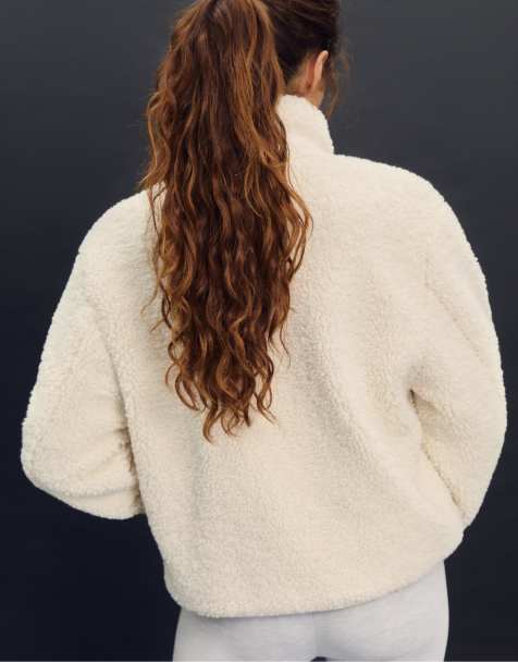 Stradivarius – Gefütterte Jacke aus vanillegelbem Lammfellimitat mit Reißverschluss - view 1