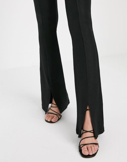 Stradivarius - Geribbelde jersey flare-broek met split in zwart, 3 van 4